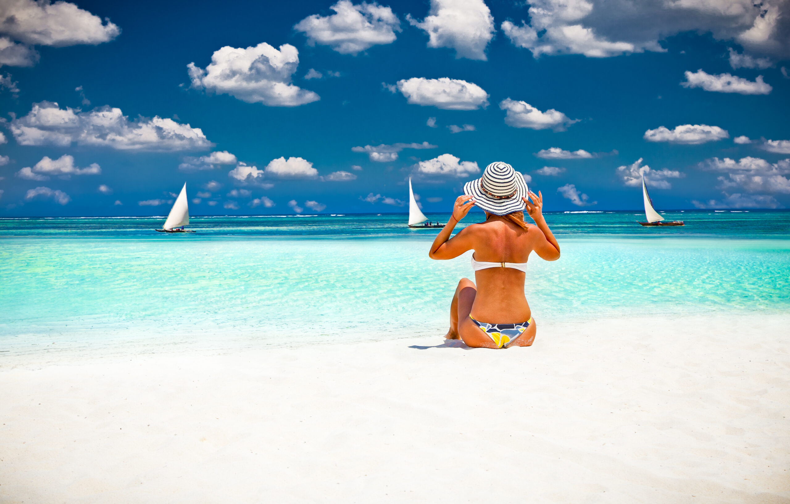 Woman relax on the beautiful tropical beach.