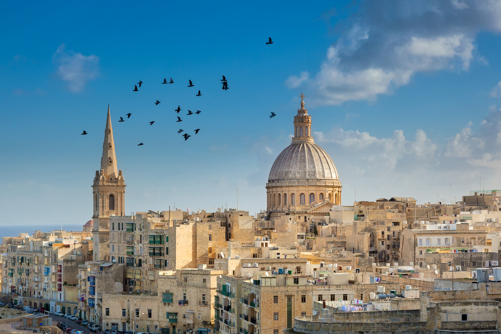 Valetta,City,Buildings,With,Birds,Flying,Over,Them,,Malta Malta