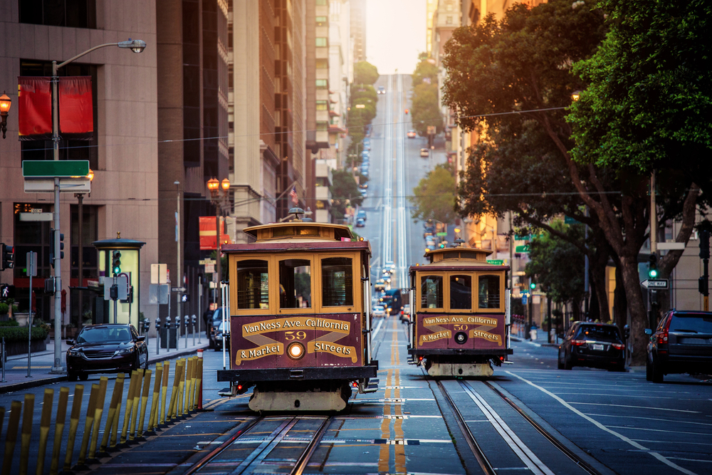 Classic,View,Of,Historic,Traditional,Cable,Cars,Riding,On,Famous